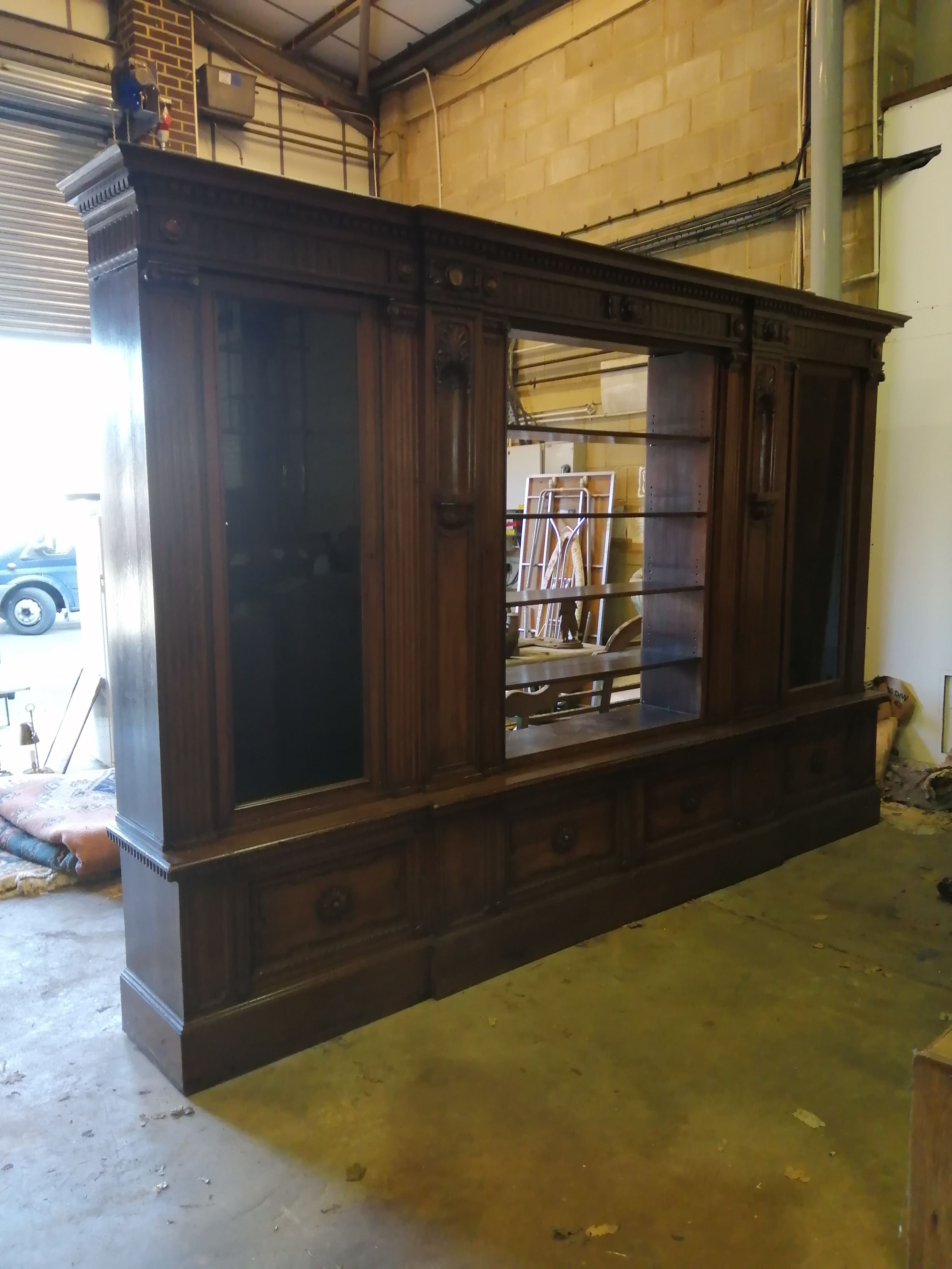 A large French 17th century style walnut bookcase / cabinet, length 360cm, depth 50cm, height 240cm